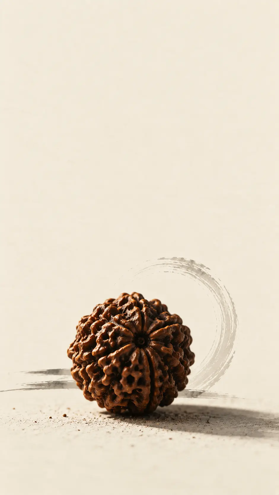 Strand of rudraksha beads on dark stone — Shiva wallpaper